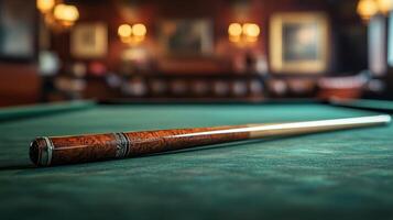 A billiard stick on a pool table photo
