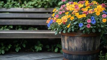 A wooden bench with a flower pot in front of it photo
