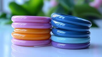 Colorful rings arranged aesthetically on a table showcasing vibrant designs and sparkling details photo