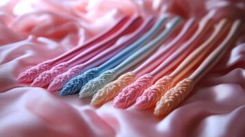 A group of six pink and blue toothbrushes photo