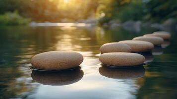 Stepping stones in the water at sunset photo