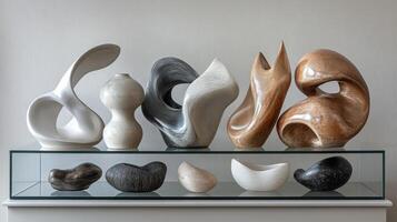 A glass display case with several different types of sculptures photo