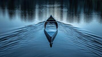 A canoe is floating on the water photo