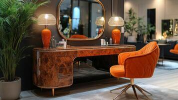 A vanity with an orange chair and mirror photo