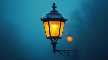 A street light is lit up in the fog photo