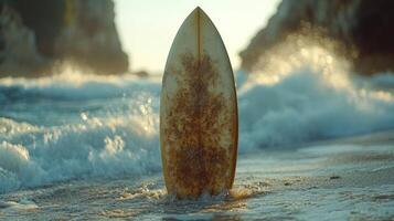 A surfboard is sitting on the beach in the ocean photo