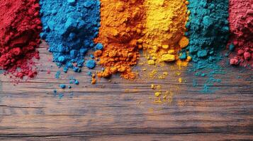 Colorful powder on wooden table photo