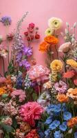 A large bouquet of flowers on a pink background photo