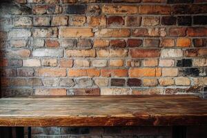 A wooden table in front of a brick wall photo