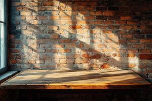An empty table in front of a brick wall photo