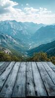 Wooden table top on the mountain view photo