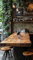 A bar with wooden tables and stools photo