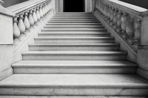 Black and white photograph of stairs in a building photo