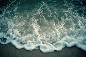 A wave is coming in to the shore photo