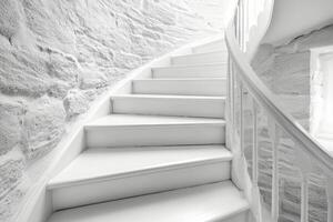 Black and white photo of a staircase in a stone building