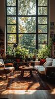 A living room with lots of plants and a window photo