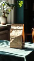 A brown paper bag sitting on a table photo