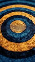 A blue and yellow circle with a target in the center photo