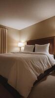 A bed with white sheets photo