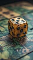 A dice sitting on top of a board game photo