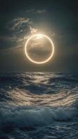 A ring of light over the ocean photo