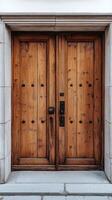 A wooden door with two black handles photo