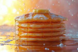 A stack of pancakes with syrup and butter on top photo
