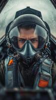 A man in a fighter jet helmet and gas mask photo