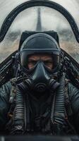 A man in a fighter jet with a mask on photo