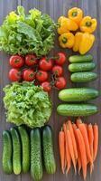 Fresh vegetables on wooden table photo