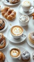 A table with many different types of pastries photo