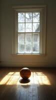 A basketball on a hardwood floor photo