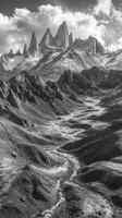 A black and white photo of a mountain range