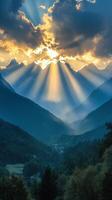 A beautiful sunset over a valley with mountains in the background photo