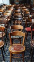 Rows of chairs in a room photo