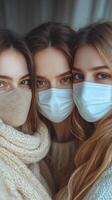 Three women wearing masks photo