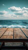 Wooden table on the beach with ocean waves photo