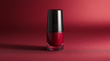 Red nail polish bottle on a red background photo