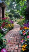 A brick pathway leads to a garden filled with flowers photo