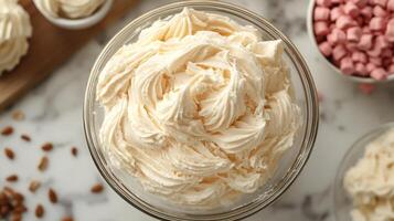 A bowl of whipped cream with other ingredients photo