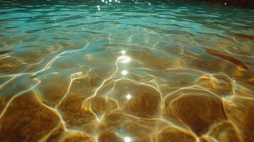 Water surface with sunlight shining through it photo