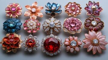 A collection of colorful brooches and earrings photo