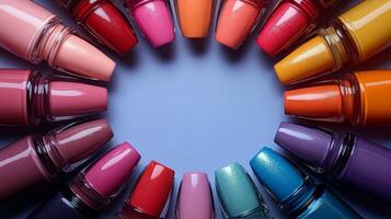 Colorful nail polish bottles arranged in a circle photo