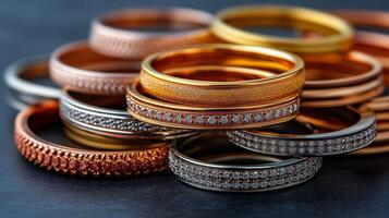 A pile of gold and silver rings photo