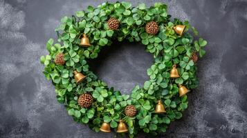 A wreath with bells and leaves on a black background photo