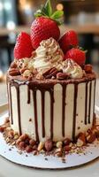 A cake with chocolate drizzle and strawberries photo