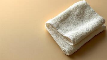 Two towels on a beige background photo