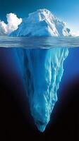 An iceberg floating in the ocean photo