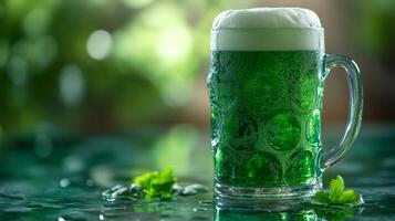 A glass of green beer sitting on a table photo