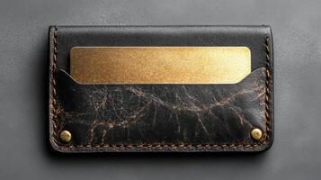 A black and gold wallet with a credit card holder photo